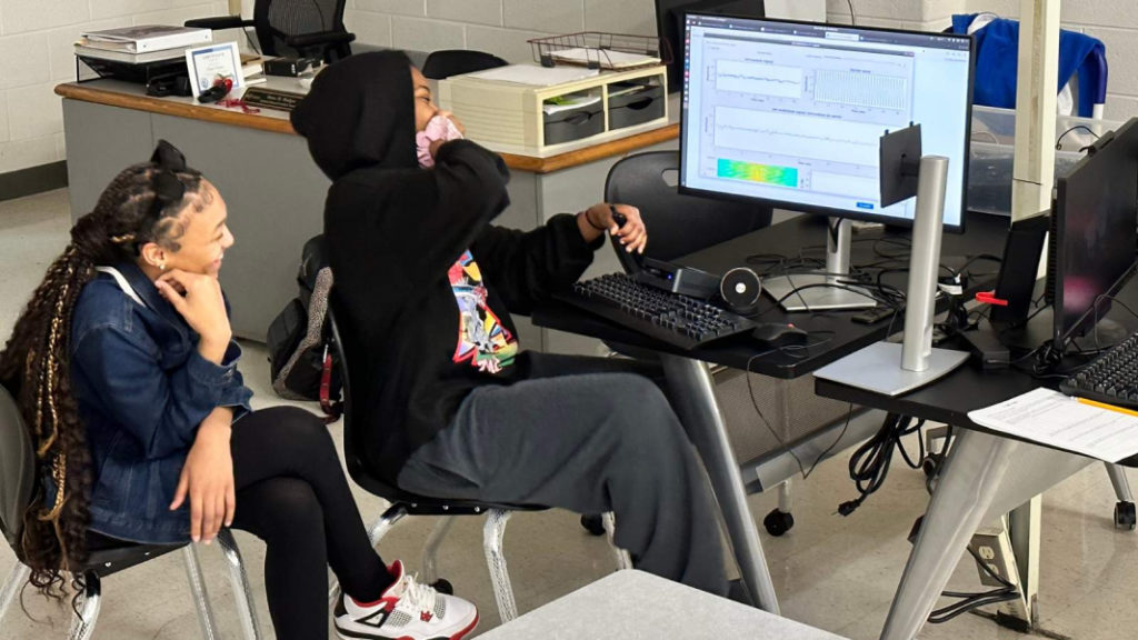 A lesson on signal interference was a big hit; students learned about the amplitude and frequency of sound waves by yelling into a microphone